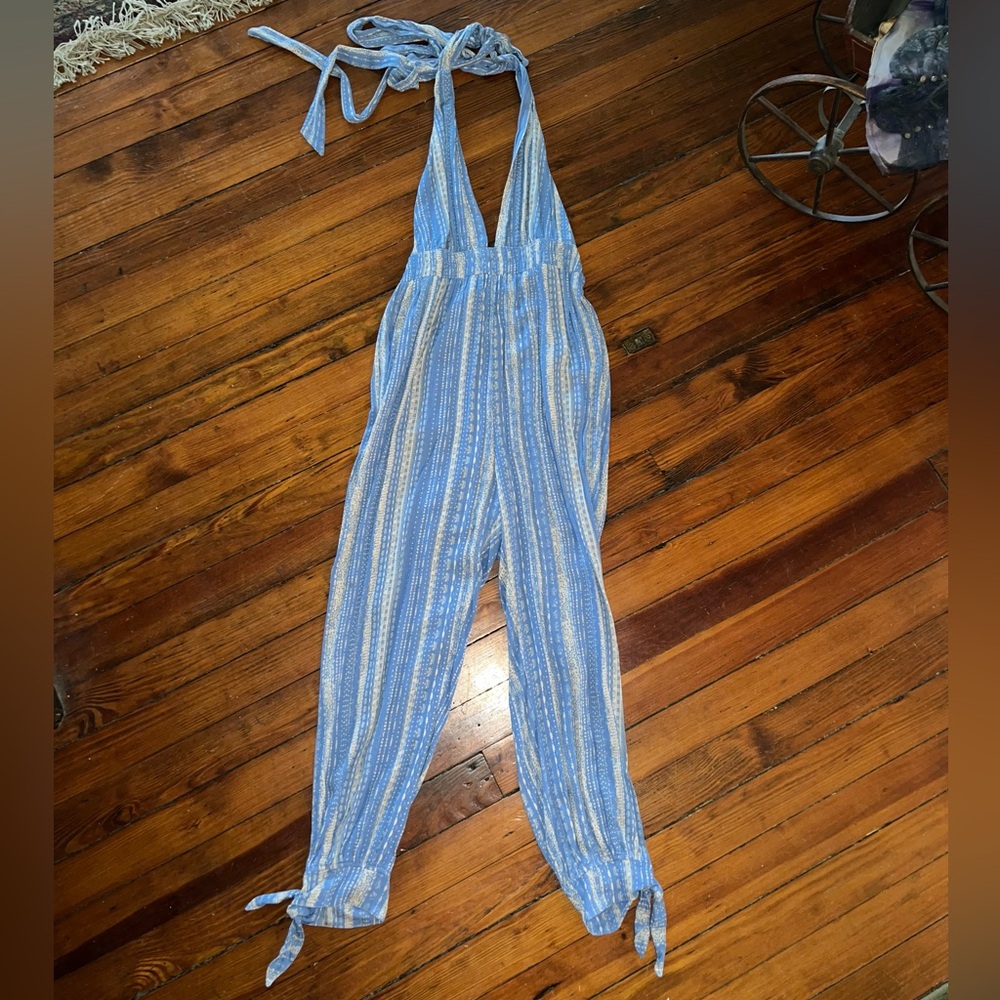 Local boutique Skylar & Madison blue printed jumpsuit with open upper back